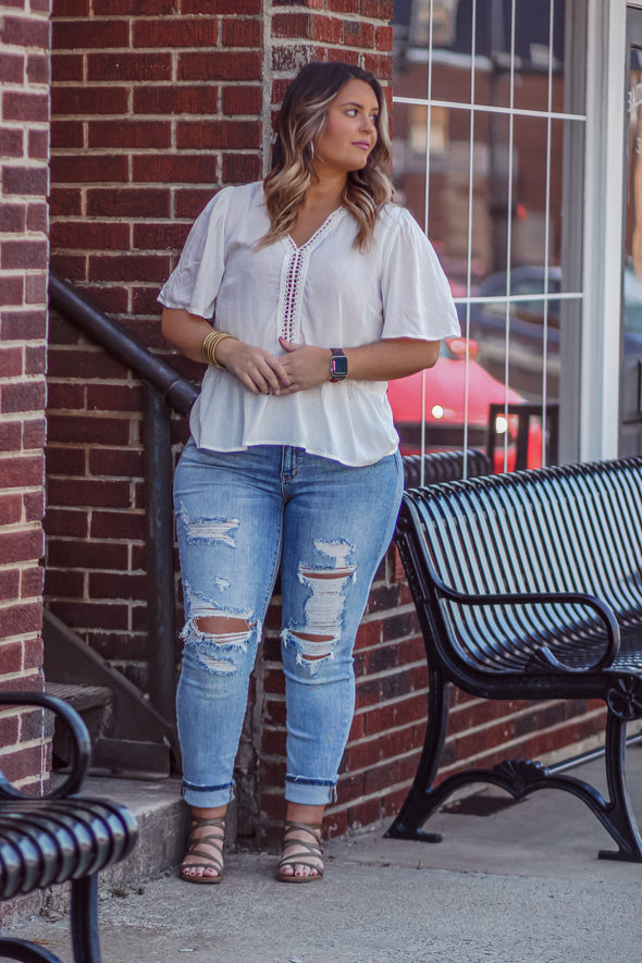 Ivory Textured V Neck Blouse