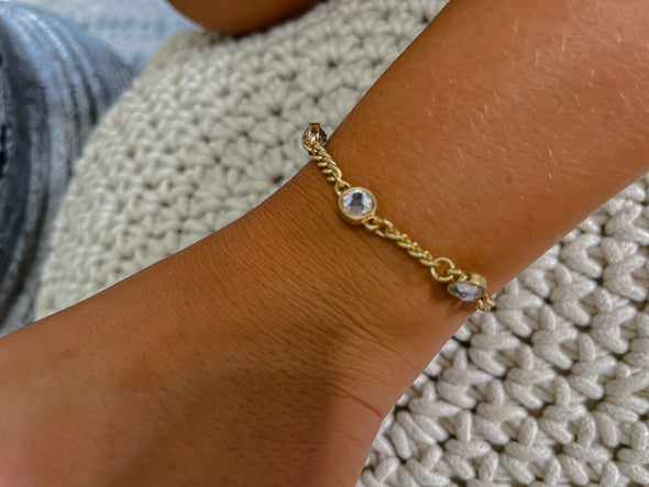 Lyra Rhinestone Curb Chain Bracelet in Worn Gold